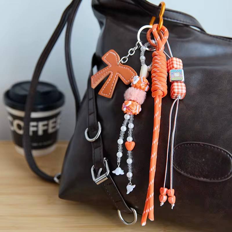 Orange bow bag charm