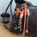 Orange bow bag charm